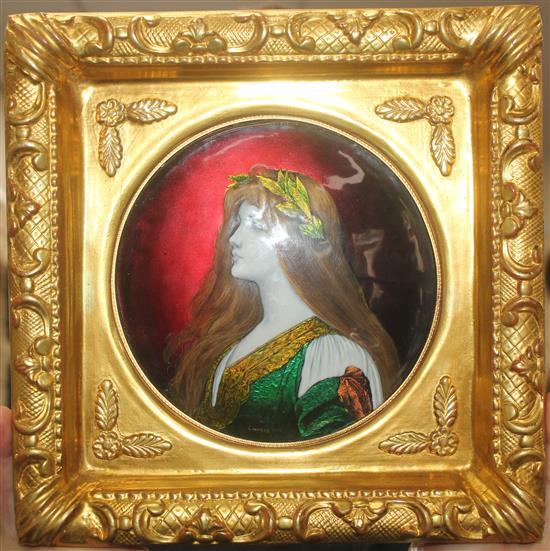 Pierre Bonnaud (1865-1930). A pair of Limoges enamel Art Nouveau circular portrait plaques, both 17cm diam., gilt frames